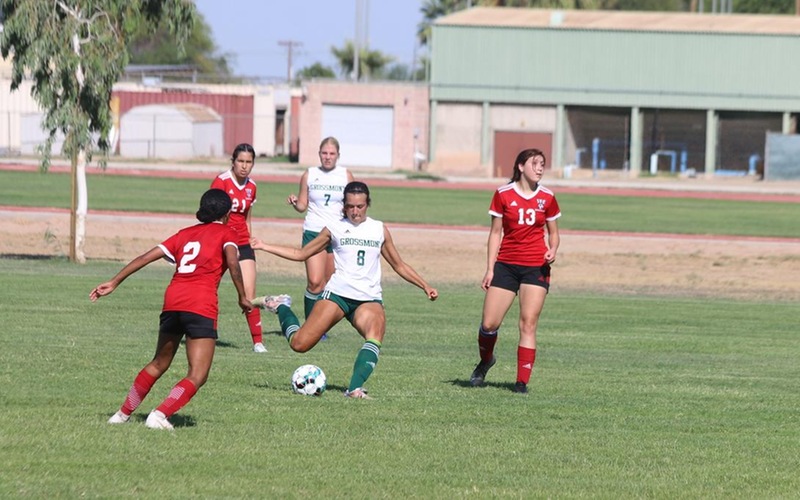 Isabel Villasana with a touch against Imperial Valley.  Photo Courtesy of the Imperial Valley Athletic Department.